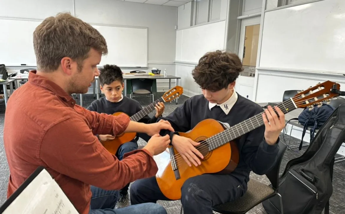 Co-Founder, Matthew, Rohde, working with new Detroit students at Holy Redeemer