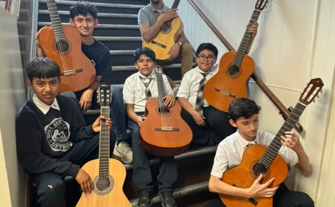 Here are some of our new Kithara Project Detroit guitar program students with the our fabulous teacher, Tony DiMambro.