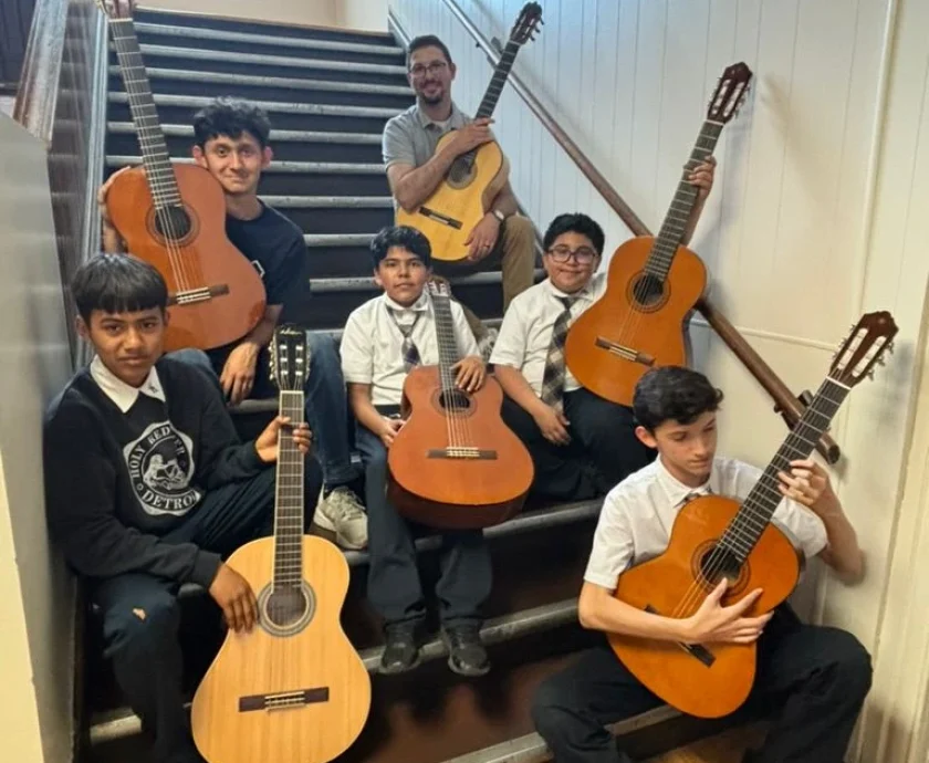 Here are some of our new Kithara Project Detroit guitar program students with the our fabulous teacher, Tony DiMambro.